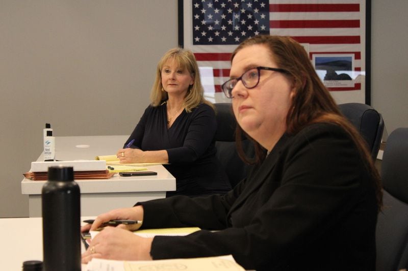 Cobb County Commission candidate Alicia Adams (left) watches as her attorney argues against her disqualification in a hearing over the residency challenge brought by Mindy Seger (right) on Friday, March 15, 2024 in Marietta. Adams is appealing her disqualification to the Cobb Superior Court. (Taylor Croft/taylor.croft@ajc.com)