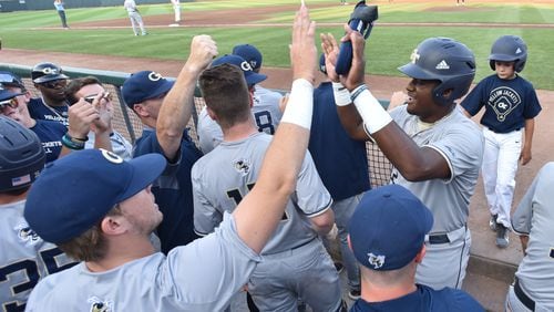 June 1, 2019 Atlanta - Georgia Tech outfielder Baron Radcliff (22) celebrates with teammates after he scored on a RBI double by Georgia Tech infielder Austin Wilhite (14) in the second inning during the second game of the NCAA regionals at Russ Chandler Stadium in Georgia Tech campus on Saturday, June 1, 2019. HYOSUB SHIN / HSHIN@AJC.COM