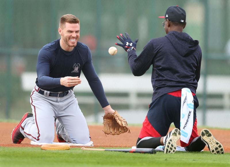 Feb 17, 2018 Lake Buena Vista: Braves first baseman Freddie Freeman is all smiles working on fielding drills with third base coach Ron Washington during spring training on Saturday, Feb 17, 2018, at the ESPN Wide World of Sports Complex in Lake Buena Vista.     Curtis Compton/ccompton@ajc.com