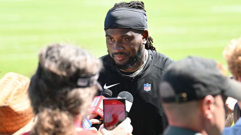 Atlanta Falcons running back Cordarrelle Patterson speaks to members of the media after the first day of training camp July 26, 2023, in Flowery Branch. (Hyosub Shin / Hyosub.Shin@ajc.com)