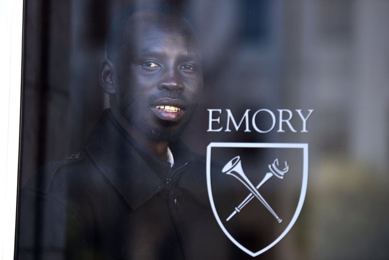 Garang Buk Buk Piol survived war in Africa and found that education was a way into a better life. With the help of friends, he is now finishing two master’s degrees at Emory University. (Hyosub Shin / Hyosub.Shin@ajc.com)