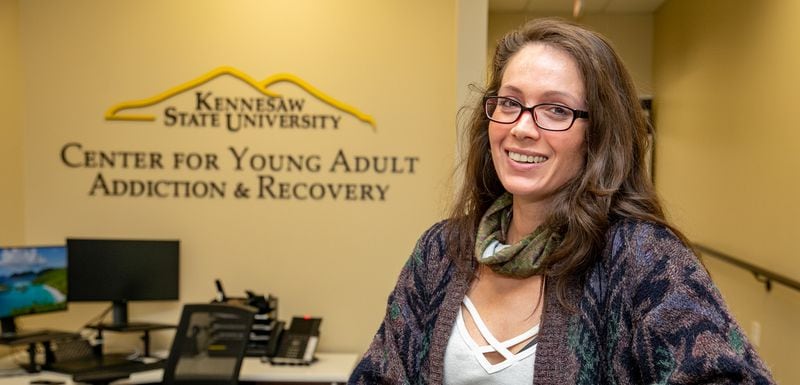 Kennesaw State University student Kevyn Wakefield works in the university's Center for Young Adult Addiction and Recovery and is close to graduating while raising her 2-year-old. (Jenni Girtman for The Atlanta Journal-Constitution)