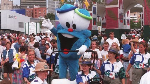 Izzy is wheeled through Centennial Olympic Park during the Games. (AJC file)