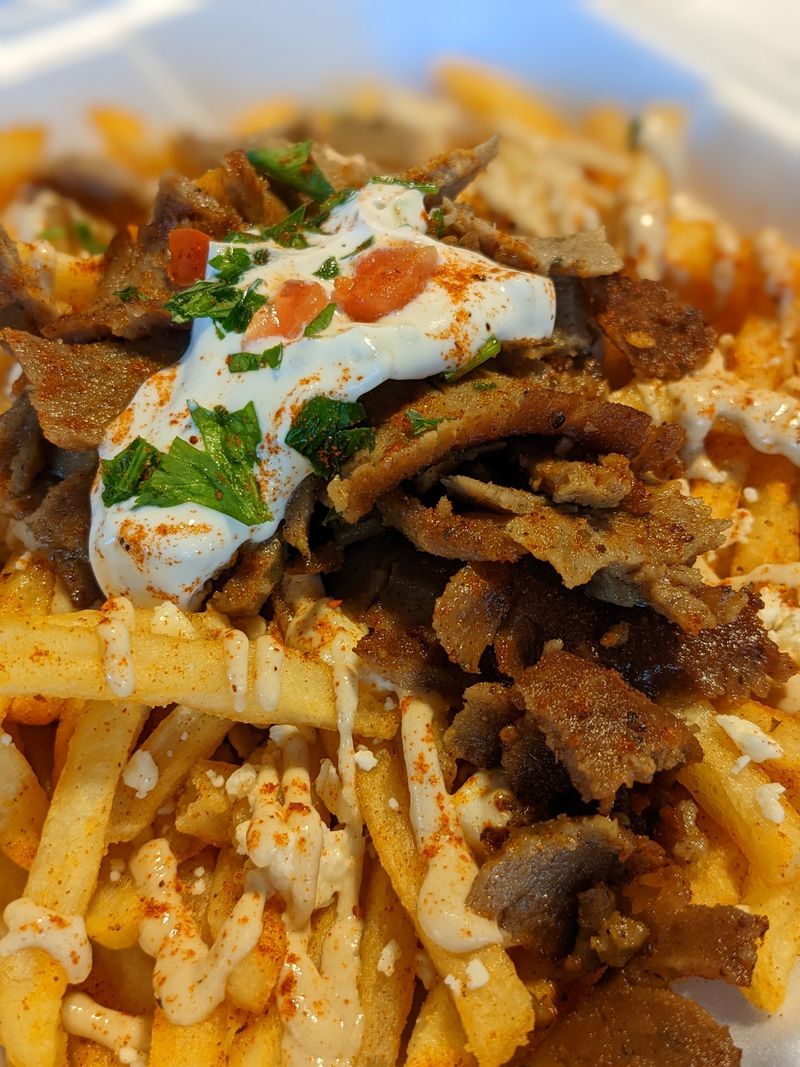 The flavor-packed loaded fries from Pita Mediterranean Street Food taste like a Mediterranean spin on poutine. Courtesy of Paula Pontes 