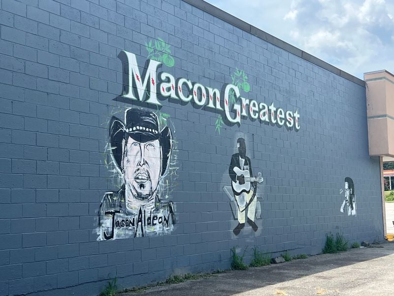 On the side of a Macon-area Dollar General, a local artist created a mural of Macon musicians, including Otis Redding and Jason Aldean.