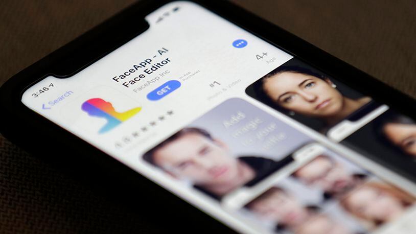 FaceApp is displayed on an iPhone. The popular mobile app is under fire for privacy concerns.