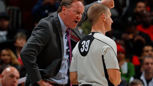Mike Budenholzer of the Atlanta Hawks reacts after a call with referee Tyler Ford during the game against the Oklahoma City Thunder at Philips Arena on December 5, 2016 in Atlanta, Georgia. (Photo by Kevin C. Cox/Getty Images)