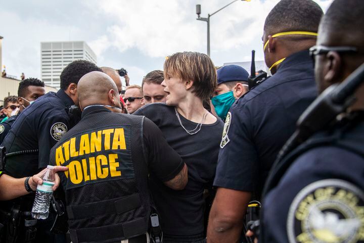 PHOTOS: Atlanta rally against police violence draws hundreds, turns violent