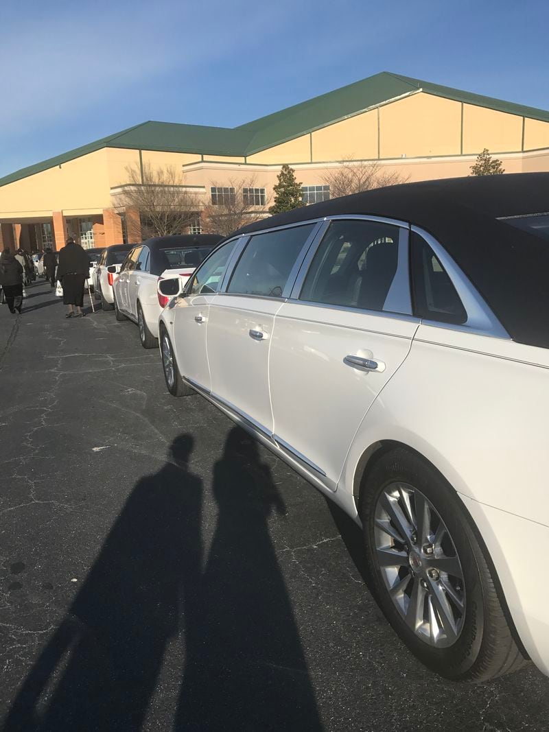 Family members arrive at Eddie Long's funeral.