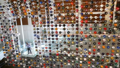 The wall of helmets at the College Football Hall of Fame.