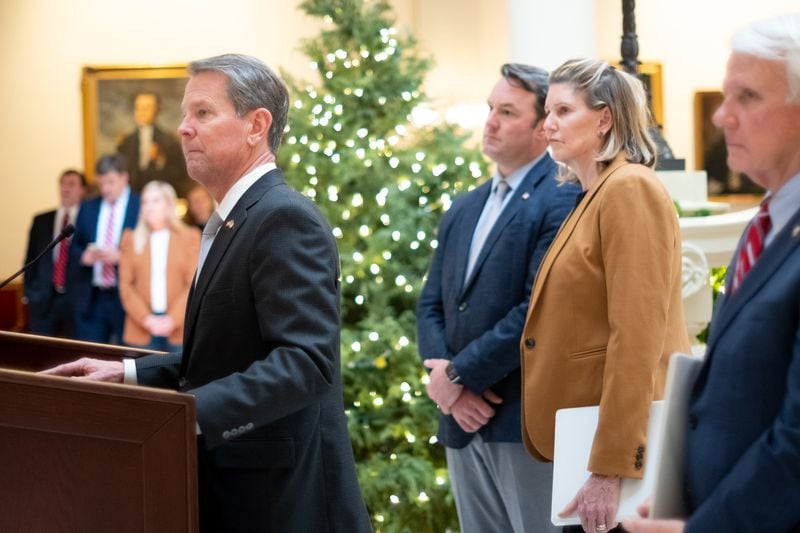 Gov. Brian Kemp, left, will enter the 2023 session of the Georgia General Assembly without two of his key partners during his first term: House Speaker David Ralston, who died in November, and Lt. Gov. Geoff Duncan, who did not seek reelection. Ben Gray for The Atlanta Journal-Constitution