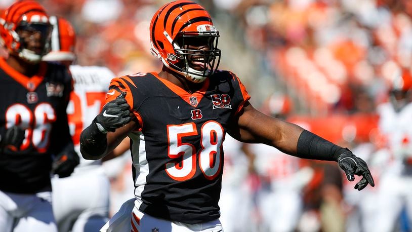 Carl Lawson #58 of the Cincinnati Bengals celebrates a play in the first half against the Cleveland Browns at FirstEnergy Stadium on October 1, 2017 in Cleveland, Ohio
