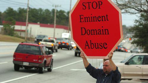 In 2006, activists took to the streets to lobby for eminent domain reform following a Supreme Court decision allowing governments to seize property for economic development. Those reforms passed in Georgia, but a bill in the Legislature erodes some of those protections. FILE PHOTO
