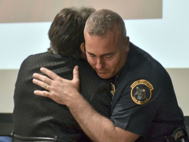 Sheila Milam, sister of the late Pamela Milam, hugs Terre Haute Police Chief Shawn Keen Monday, May 6, 2019. Keen announced Monday that DNA evidence and familial genealogy has revealed Jeffrey Lynn Hand as the likely killer of Milam 46 years ago on the Indiana State University campus. Milam, 19, was last seen alive the night of Sept. 15, 1972, following a sorority event on campus. The ISU sophomore was found strangled, bound and gagged in the trunk of her car the following day by her family. Hand, who was 23 at the time of Milam’s slaying, killed a hitchhiker nine months later, but was found not guilty by reason of insanity and released in 1976. He was killed by police during a botched kidnapping two years later.