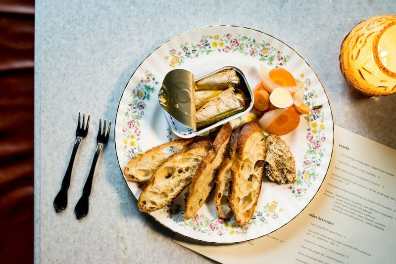 Cardinal smoked sardines with piri piri and pickle, dude egg, and crostini. Photo credit- Mia Yakel.