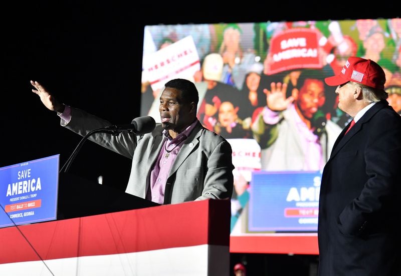 Former President Donald Trump, right, backed Herschel Walker as the GOP candidate in Georgia's 2022 U.S. Senate race. Walker lost in a runoff against Democratic U.S. Sen. Raphael Warnock. Trump also saw his picks in four statewide races lose to incumbents in that year's GOP primary. (Hyosub Shin/The Atlanta Journal-Constitution/TNS)