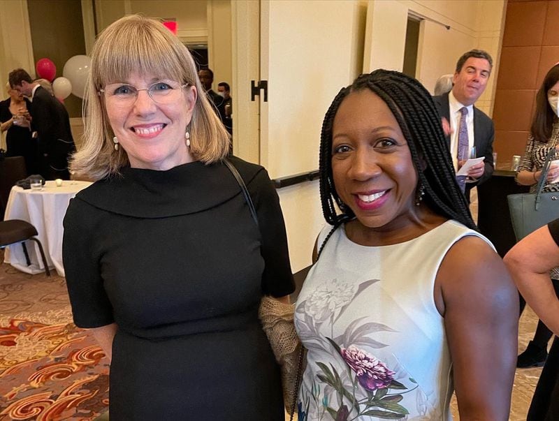 AJC Senior Editor for Politics Susan Potter (left) joins Reporter Tia Mitchell at the 76th Annual Congressional Dinner on May 12, 2022