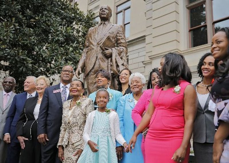 Georgia leaders, including Gov. Nathan Deal, Sandra Deal, members of the King family and Rep. Calvin Smyre were on hand for unveiling of the first statue of Martin Luther King Jr. on Monday at the Capitol. BOB ANDRES /BANDRES@AJC.COM