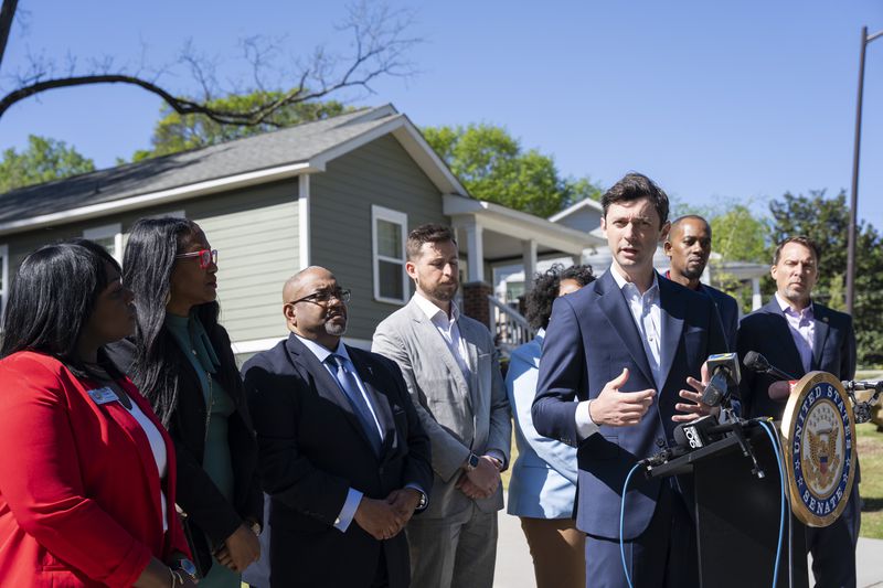 U.S. Sen. Jon Ossoff, D-Ga., (at the microphone) is an advocate for prison reform. 