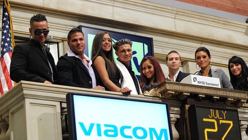 FILE PHOTO: TV personalities Michael 'The Situation' Sorrentino, Ronnie Ortiz-Magro, Sammi 'Sweetheart' Giancola, Paul "Pauly D" DelVecchio, Nicole 'Snooki' Polizzi, Vinny Guadagnino, Jenni 'J-WOW' Farley and Angelina 'Jolie' Pivarnick ring the opening bell at the New York Stock Exchange on July 27, 2010 in New York City.  (Photo by Jason Kempin/Getty Images)