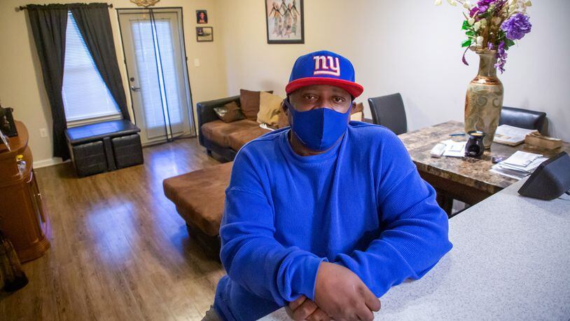 Kenneth Walker sits in his apartment at the  Manor at Indian Creek in Stone Mountain Mondy, November 29, 2021.  STEVE SCHAEFER FOR THE ATLANTA JOURNAL-CONSTITUTION