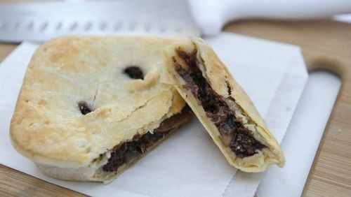 The Aussie Meat Pie has USDA ground chuck combined with USDA ground beef in a beef-seasoned gravy with a flaky pastry top. It’s from the Australian Bakery Cafe on the Marietta Square. CONTRIBUTED BY BECKY STEIN