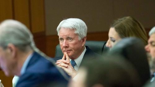 Claud "Tex" McIver sits with his attorneys after they rest their case in his trial before Fulton County Chief Judge Robert McBurney, on Friday, April 13, 2018. ALYSSA POINTER/ALYSSA.POINTER@AJC.COM