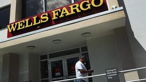 MIAMI, FL - SEPTEMBER 09: A Wells Fargo sign is seen on the exterior of one of their bank branches on September 9, 2016 in Miami, Florida. Reports indicate that more than 5,000 Wells Fargo employees have been fired as a result of a scandal involving employees that secretly set up new fake bank and credit card accounts in order to meet sales targets. (Photo by Joe Raedle/Getty Images)