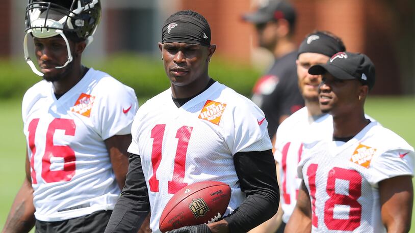 June 13, 2017, Flowery Branch: Falcons wide receivers Anthony Dable (from left), Julio Jones, and Taylor Gabriel during the first day of mini-camp on Tuesday, June 13, 2017, in Flowery Branch. Curtis Compton/ccompton@ajc.com