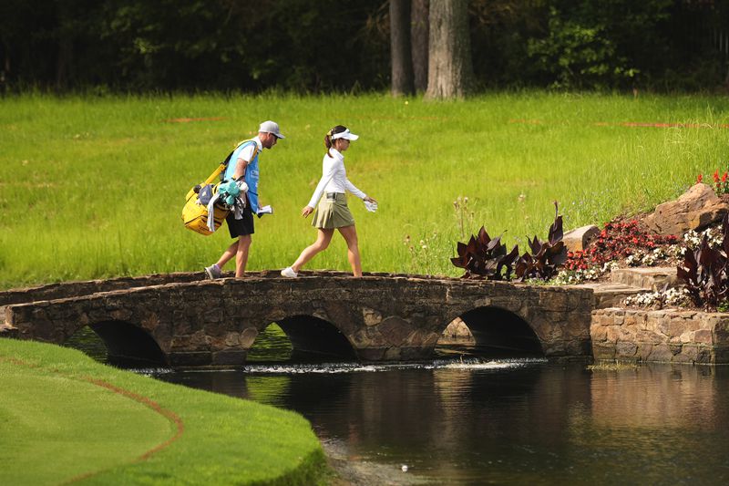 Lydia Ko crosses the fairway bridge on the 15th hole during the first round of the Chevron Championship LPGA golf tournament Thursday, April 18, 2024, at The Club at Carlton Woods, in The Woodlands, Texas. (AP Photo/David J. Phillip)