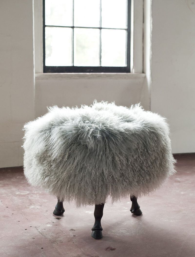 The Tibetan wool-covered ottoman sits on three carved horse hoof legs. Designed and made in North Carolina by vanCollier, the whimsical Finn Ottoman is available in custom sizes and finishes. Contributed by www.vanCollier.com