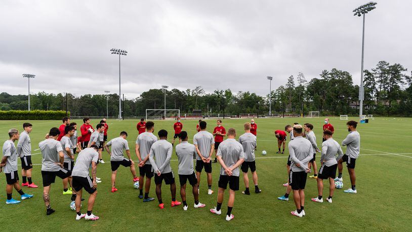 Atlanta United manager Frank de Boer addresses the team Monday, June 8, 2020, as they returned for full team in Marietta. Major League Soccer announced that clubs could return to full team training in preparations for the resumption of games next month in Orlando.