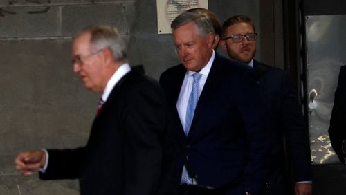 After hours of testimony, Mark Meadows (center), the former White House Chief of Staff, is seen leaving the federal court in Atlanta on Monday, August 28, 2023. He appeared in an Atlanta courtroom to attempt the transfer of his Fulton County racketeering case to federal court.
Miguel Martinez /miguel.martinezjimenez@ajc.com