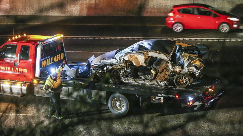Gwinnett County police investigated a deadly wrong-way crash on I-85 south near Jimmy Carter Boulevard that shut down the interstate for hours on Jan. 20. JOHN SPINK /JSPINK@AJC.COM