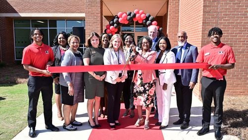 Henry County leaders celebrate ribbon cutting of Dutchtown High School addition on Thursday, April 20, 2023.