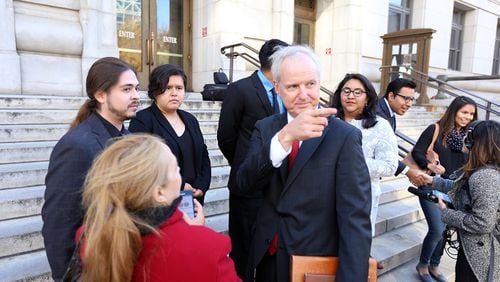 Dec. 1, 2016: Local immigration attorney Charles Kuck met with plaintiffs outside the Fulton County Superior Court in downtown Atlanta after he argued immigrants who have received a special reprieve from deportation from the Obama administration should be allowed to pay in-state tuition in Georgia. The judge sided with them in a decision that was made public Tuesday. MIGUEL MARTINEZ/MUNDO HISPANICO
