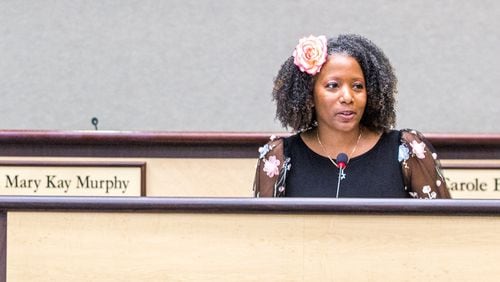 Tarece Johnson speaks after being sworn in as a member of the Gwinnett County Board of Education on Dec. 17, 2020. Johnson has been outspoken about equity and justice in schools and recently drew attention from a Republican lawmaker over comments about race and racism she made online. (Jenni Girtman for The Atlanta Journal-Constitution)
