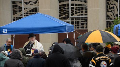 Worshippers listen to Rabbi Chuck Diamond, former Rabbi of the Tree of Life Congregation, as he conducts a Shabbat prayer vigil Saturday morning in the in front of the Tree of Life Synagogue on November 3, 2018 in Pittsburgh, Pennsylvania. Synagogues around Pittsburgh are opening their doors to members of the Tree Of Life congregation that was the target of a mass shooting that left 11 of its members dead on October 27.