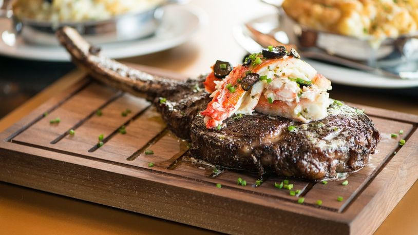 Del Frisco's Double Eagle Steakhouse  Long- Bone Ribeye Wagyu Steak with crab. Photo credit- Mia Yakel.