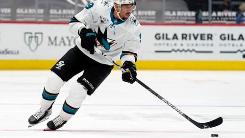 San Jose Sharks left wing Evander Kane moves the puck  against the Arizona Coyotes March 26, 2021, in Glendale, Ariz. The NHL says it will investigate an allegation made by Kane’s wife that he bets on his own games and has intentionally tried to lose for gambling profit. (Rick Scuteri/AP)