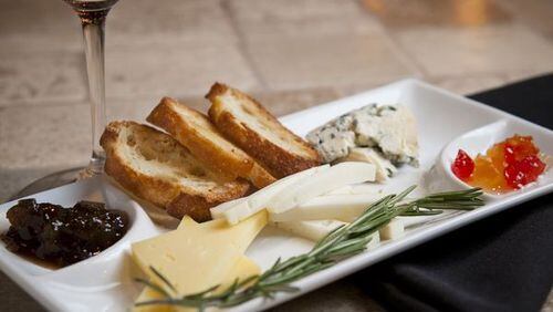 Photo credit: Vine & Tap cheese and charcuterie plate. Photo Credit: Heather Photographers