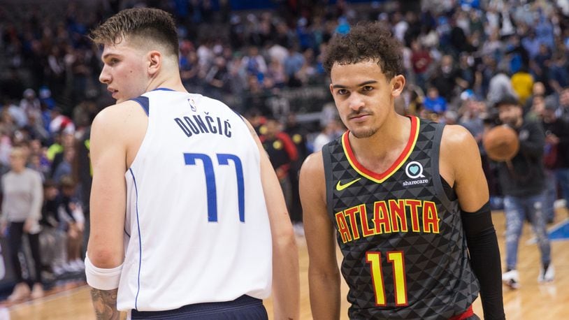 Mavericks forward Luka Doncic (77) and Hawks guard Trae Young will be linked forever because of their draft-night trade.