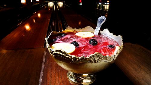 The Old One Two punch bowl at the Hotel Roosevelt's Spare Room in Hollywood. With sipping in mind, it's made with cognac, berries, lemon juice and sugar, then topped with Champagne. (Kirk McKoy/Los Angeles Times/TNS)