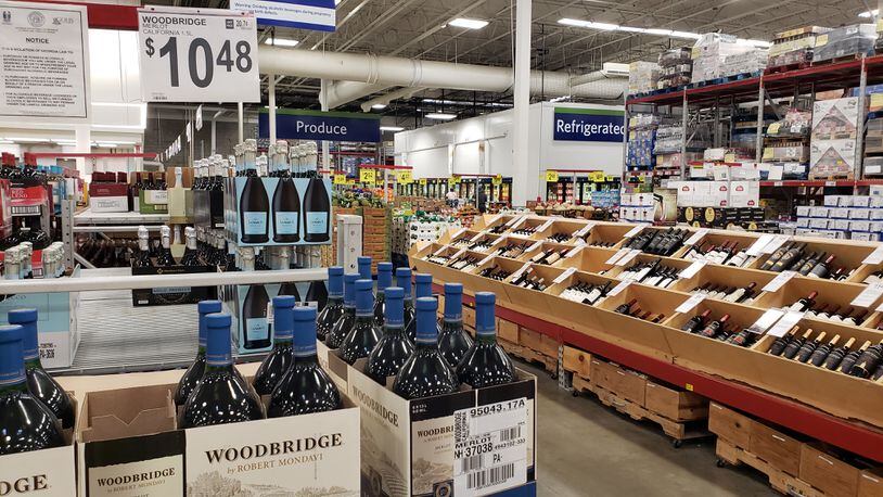 Alcohol sales in Georgia were at a 12-year high in July, just as COVID-19 cases peaked in Georgia. Alcohol supplies have had no trouble keeping up with demand, as evidenced by full shelves at a Sam's Club in DeKalb County. (George Mathis/gmathis@ajc.com)