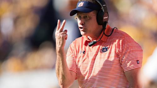 Auburn's Gus Malzahn at work against LSU, the Tigers lone conference loss. (Wesley Hitt/Getty Images)