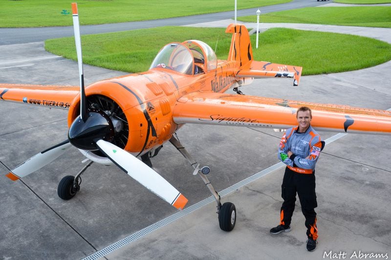 During the week, Nowosielski, 41, is a commercial pilot for Southwest Airlines. On the weekends, he hops into an orange-striped Tiger Yak 55 aircraft to make loops and tumbles through the sky as one-half of the Twin Tigers, a stunt pilot team formed by fellow Southwest pilot, Mark Sorenson.