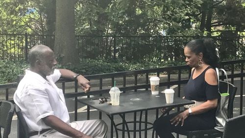 Marvin Greer (left) meets friend Lee Kimbrough for coffee at the Starbucks location at 3660 Cascade Road in southwest Atlanta. “Starbucks has to understand it is more than a coffeehouse. It is a neighborhood gathering spot,” Greer said. LIGAYA FIGUERAS