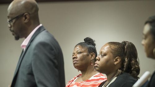 Angela Dalton (center) appeared in front of Atlanta Municipal Court Judge Herman Sloan as part of court-ordered monitoring in an October 2018 case. The court had no set program for a woman facing her challenges, so attorneys worked with social workers and others to cobble one together. ALYSSA POINTER / ALYSSA.POINTER@AJC.COM