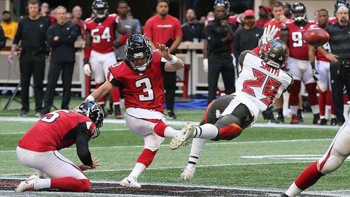 <p>Atlanta Falcons kicker Matt Bryant just gets off the field goal for a 34-29 lead over the Tampa Bay Buccaneers during the final minute Sunday, Oct. 14, 2018, in Atlanta. (Photo: Curtis Compton, AJC)</p>