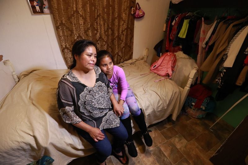 Feb. 5, 2019 Vidalia: Vilma Carrillo, a Guatemalan woman seeking asylum in the United States, and her 12-year-old daughter Yeisvi. They were recently reunited after being separated for many months following Vilma’s arrest on the southwest border. They share a mobile home with other relatives in Vidalia. Curtis Compton/ccompton@ajc.com